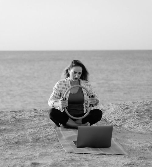 Person demonstrating balance and focus during an exercise routine.